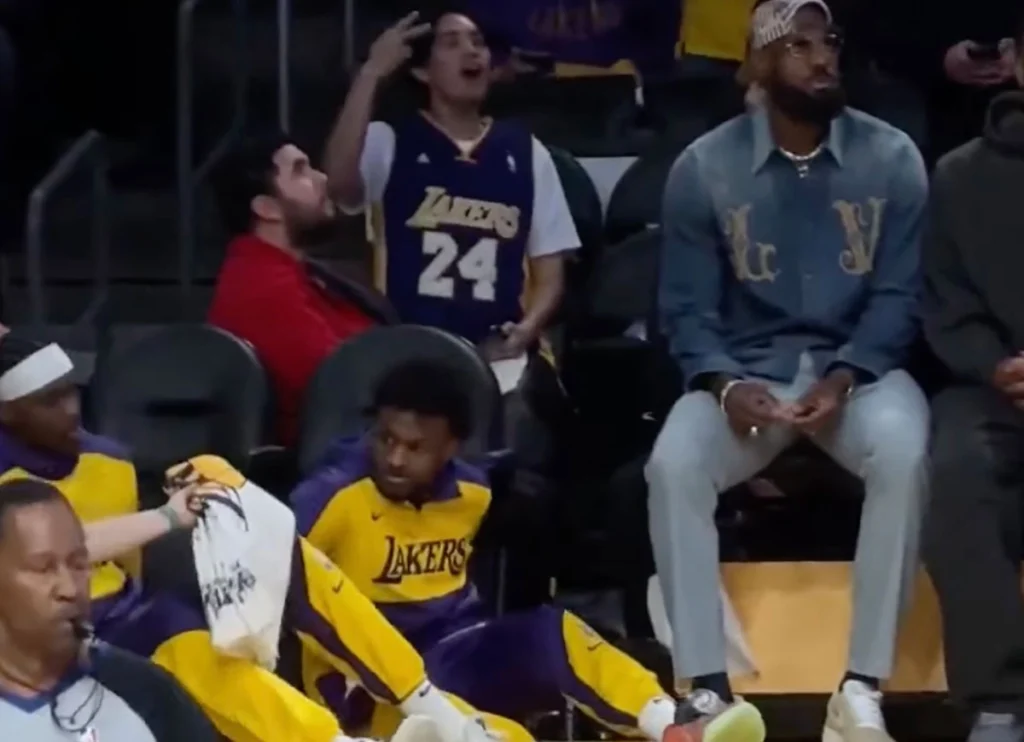 VIDEO: Bronny James Made To Sit On Floor To Make Room For Legendary Dad LeBron James On Bench