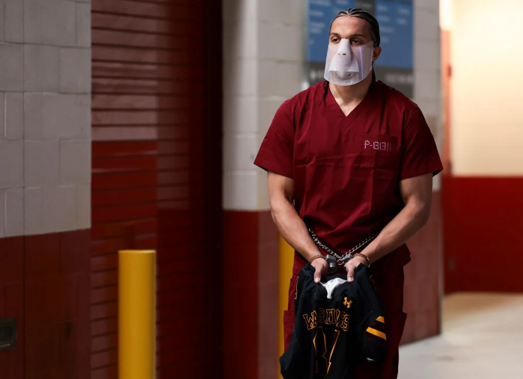 Patriots’ Mack Hollins Makes Big Entrance At Super Bowl LX Dressed Like Hannibal Lecter In Face Mask & Handcuffs