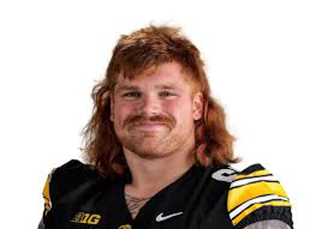 Iowa OT Gennings Dunker Wins Praise For Flowing Red Mullet, Hopes To Hear His Name At NFL Draft