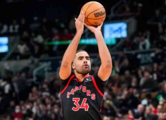 TORONTO, ON - FEBRUARY 9: Jontay Porter #34 of the Toronto Raptors shoots against the Houston Rockets during the first half of their basketball game at the Scotiabank Arena on February 9, 2024 in Toronto, Ontario, Canada. (Photo by Mark Blinch/Getty Images)