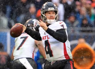 CHICAGO, ILLINOIS - DECEMBER 31: Taylor Heinicke #4 of the Atlanta Falcons throws a pass in the game against the Chicago Bears at Soldier Field on December 31, 2023 in Chicago, Illinois. (Photo by Justin Casterline/Getty Images)